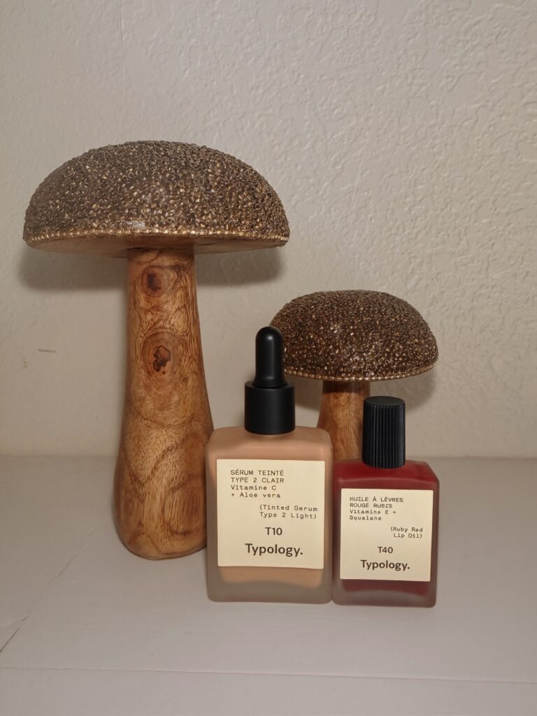 Typology Skincare products against a Cream background with Autumn mushrooms